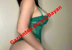 Side view of a person wearing a green lingerie bodysuit, with diagonal watermark text reading 'Gaziantep Escort Bayan'.